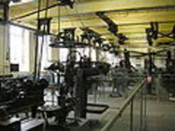 Machines in motive power room with power relay system on ceiling in Bradford Industrial Museum, author Linda Spashett